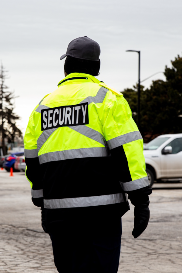 Uniformed security officer at The Kharis checkpoint